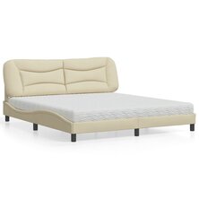 Bed met matras stof cr&egrave;mekleurig 180x200 cm